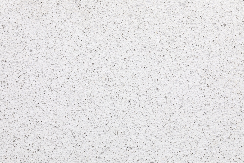 A close up image of RAAC. White concrete with tiny air bubbles.
